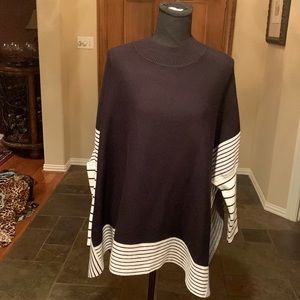 Great black poncho w/slits on sides & black & cream striped bottom & sleeves.